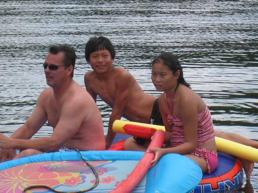 Uncle Dave, Tyler and Anna in the inner tube