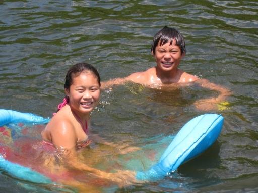Tyler and Anna swimming in the lake