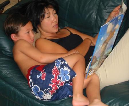 Matthew with Mom reading a book