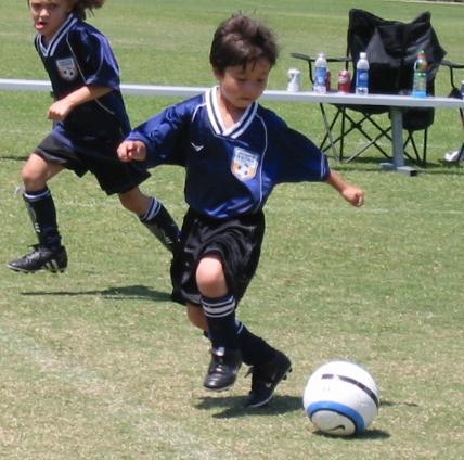 Ryan playing soccer
