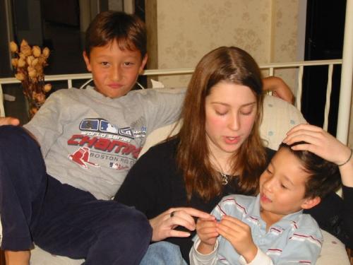 The boys with Rachel at Chanukah